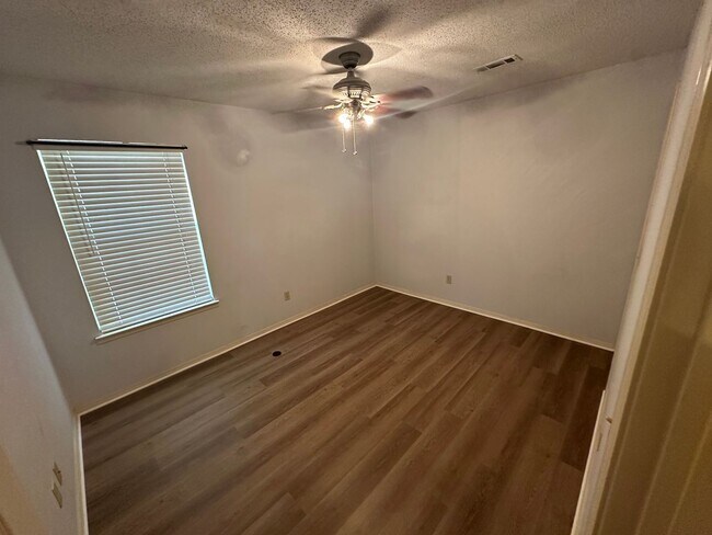Photo - 3-Bed, 2-Bath Home in Central Springdale - Fully Fenced in Backyard and 2x Car Garage!
