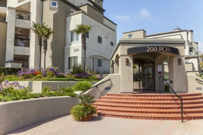 Building Photo - Ocean View Condo Just Steps from Main Street & the Beach – 3 Balconies, Gated Community, Pool & P...
