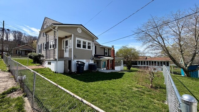 Photo - Spacious Updated 5BR Home with Flexible Living Options