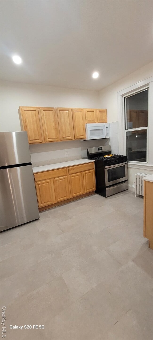 Building Photo - 238-05 Braddock Ave Unit 2