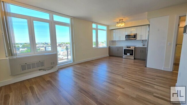 Photo - Top-Floor 1-Bedroom with Private Balcony & Manhattan Skyline Views! Unit 7B
