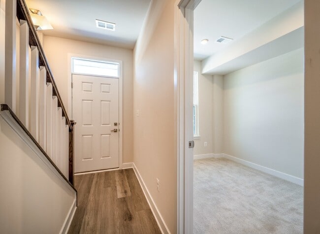Photo - This 3-bedroom, 3-full bathroom townhouse offers a pristine and contemporary living experience.