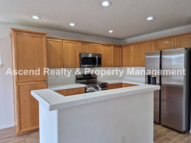 Photo - Bethany 3 Bed + Office on Main Fenced Back Yard w/Deck 2 Car Attached Garage Available Now!