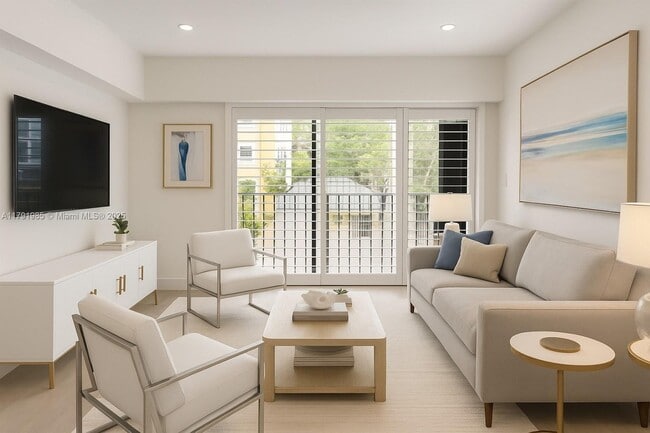 Living room area virtually staged - 575 Crandon Blvd Unit #307