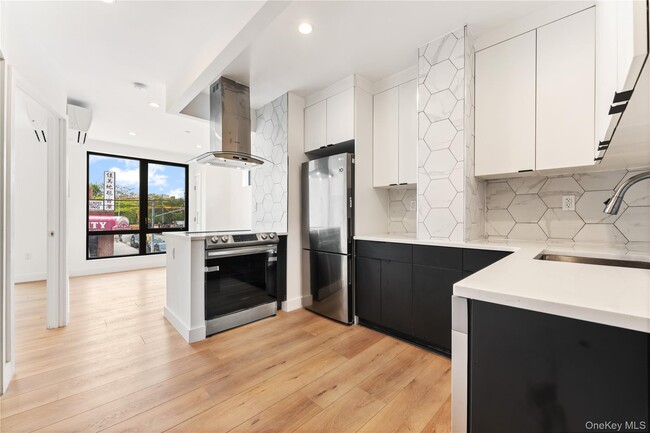 Building Photo - 901 60th St Unit 3A