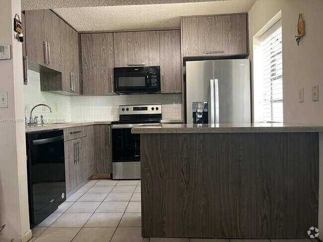 Building Photo - 9813 NW 3rd St Unit 9813 Rental