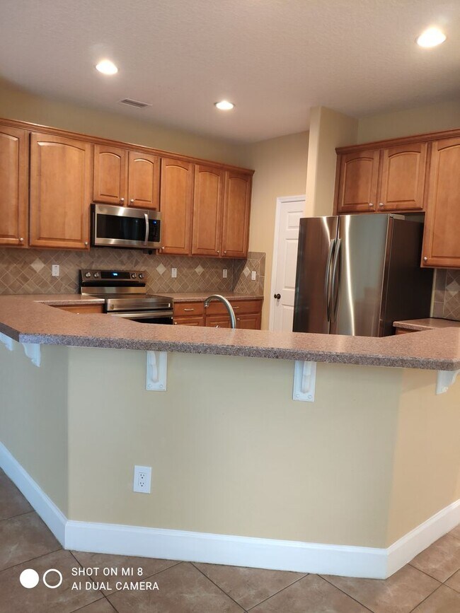 Photo - Luxurious 4/3/2 with circular driveway. Available after 06/10/26