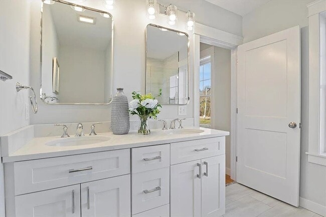 Master Bathroom with Dual Vanity and walk in shower - 603 Portsmouth Ave Condo Unit 204