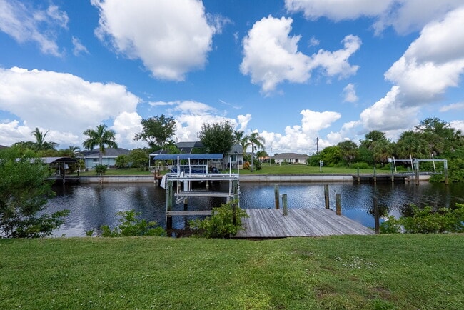 Photo - 3 BEDROOM • 2 BATHROOM • PRIVATE POOL • WATERFRONT • BOAT LIFT • ZERO DEPOSIT MOVE-IN AVAILABLE