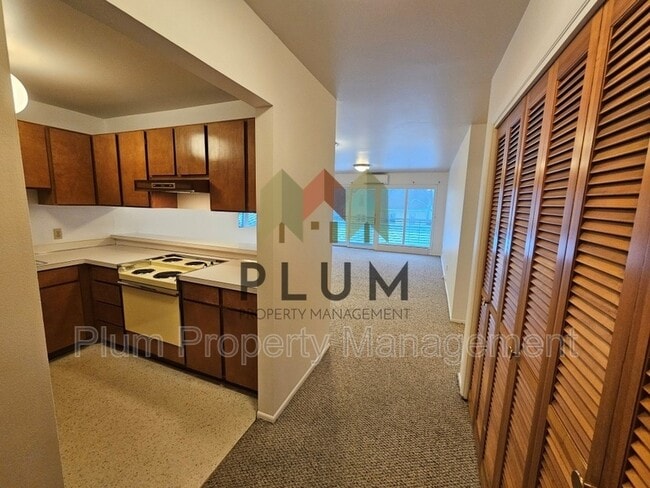 Building Photo - 1547 S Higgins Ave Unit #207