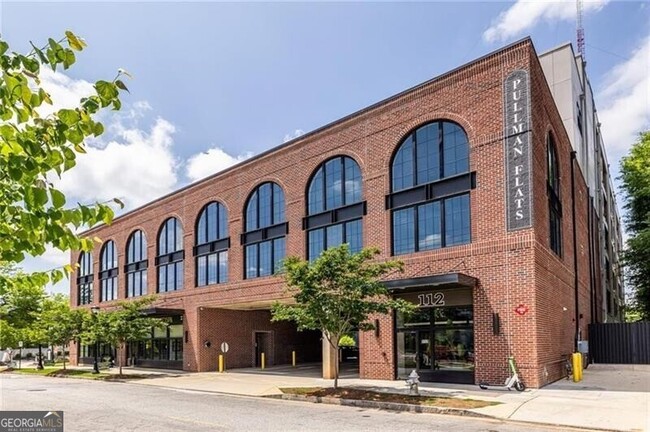 Building Photo - 112 Rogers St NE Unit 408