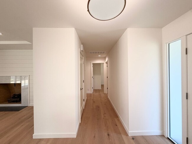 Photo - This premier 4-bed, 3-bath estate spans 2,565 sq. ft. on a 10,253 sq. ft. lot in North Los Altos.