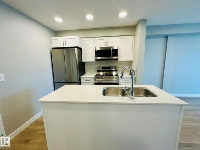 Photo - #320 1506 TAMARACK BV NW