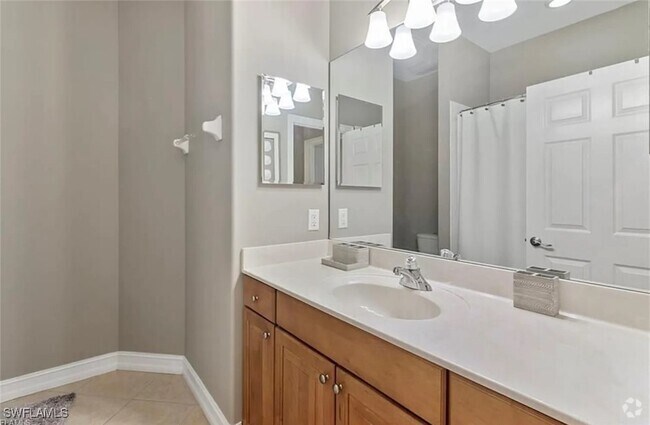 Building Photo - 12051 Brassie Cir Unit 202 D Rental