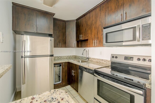 Building Photo - 7130 NW 179th St Unit 104