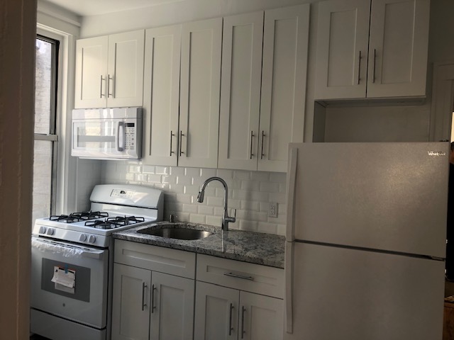 kitchen - 2907 Ditmars Blvd Apartments Unit 2R