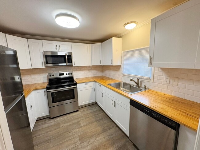 Photo - 2 Bedroom and 1 Bath Cottage with private parking and large back yard.