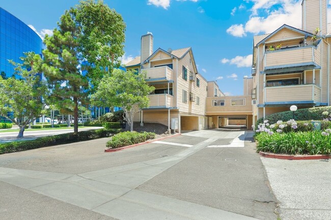 Building Photo - Top-Floor Condo in UTC – Updated and Move-...