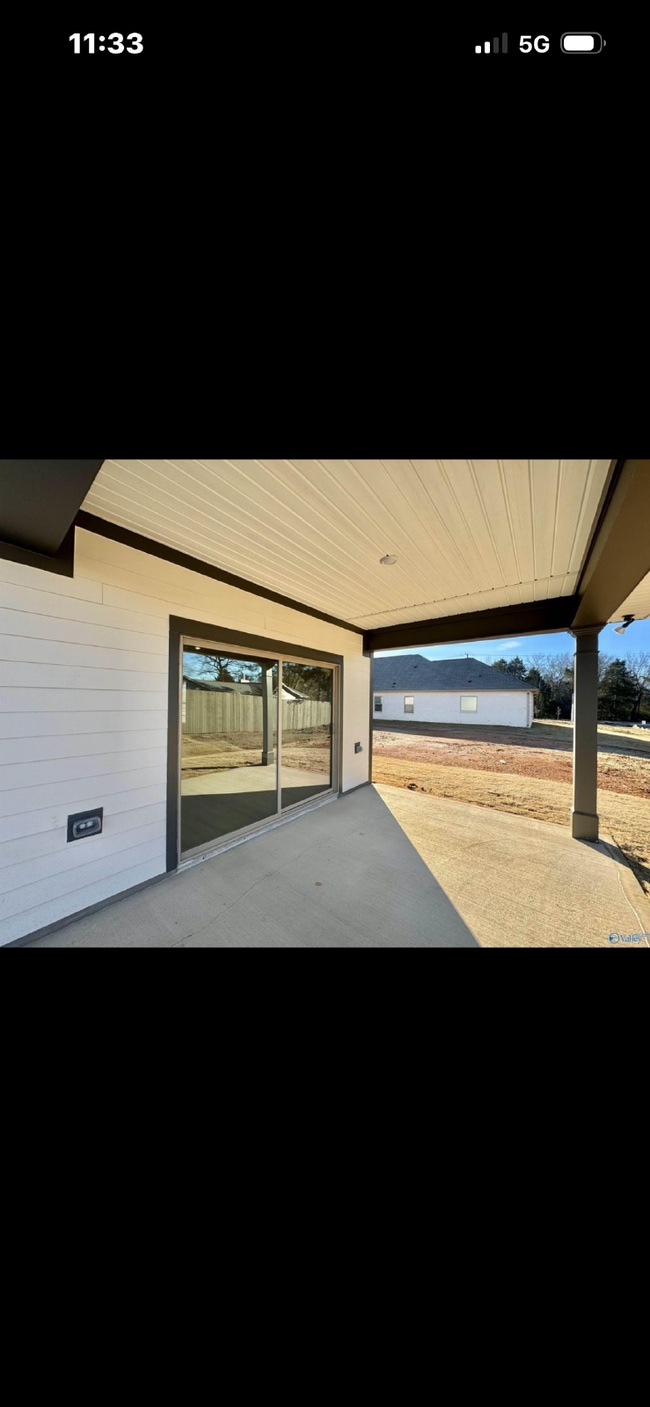 Photo - "NEWLY BUILT- Spacious 4-Bedroom Haven with Granite Elegance and Cozy Fireplace in Harvest"