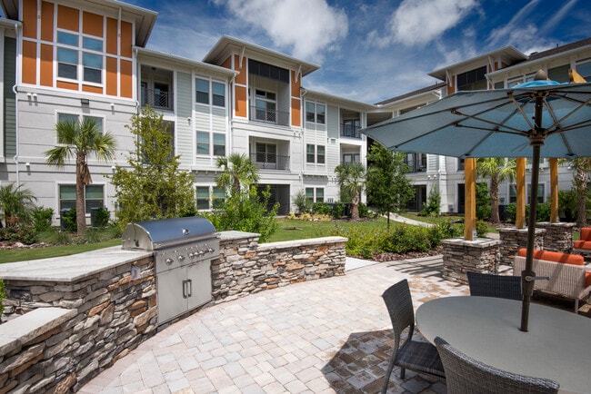 Fire up the grill and enjoy outdoor dining with friends