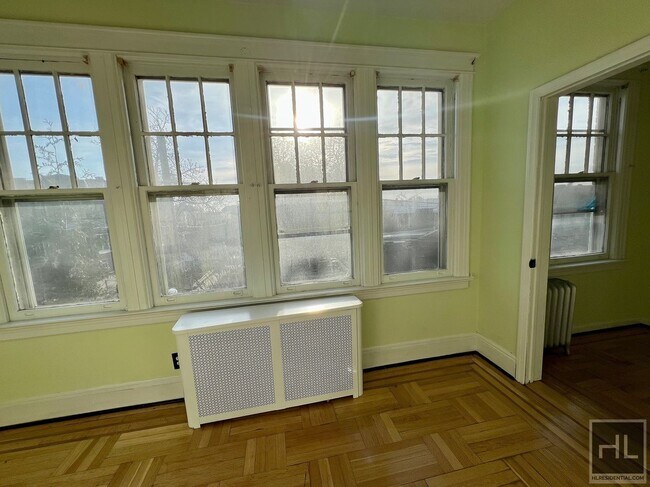 Photo - 3.5BR 2BA Massive Townhouse w/ Sunroom & Optional Private Parking In Maspeth Unit 2