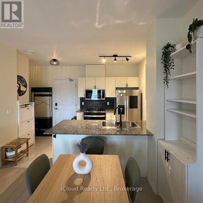 Photo - 1360 Costigan Rd Unité 304