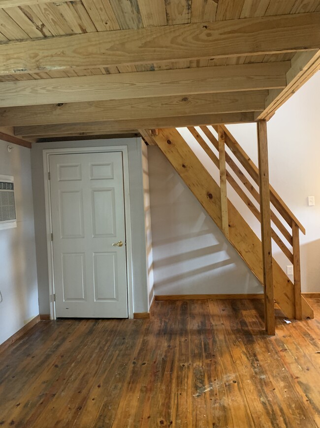 Closet in living room with stair to loft - 1112 Cardinal St #106 Unit Lofts on Lanana