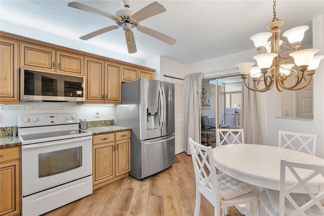 Building Photo - 9599 Weldon Cir Unit A107