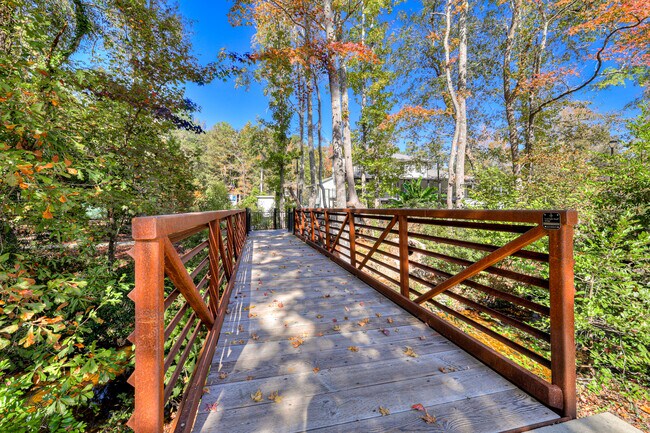 Bridge over Rae's Creek that flows through the community