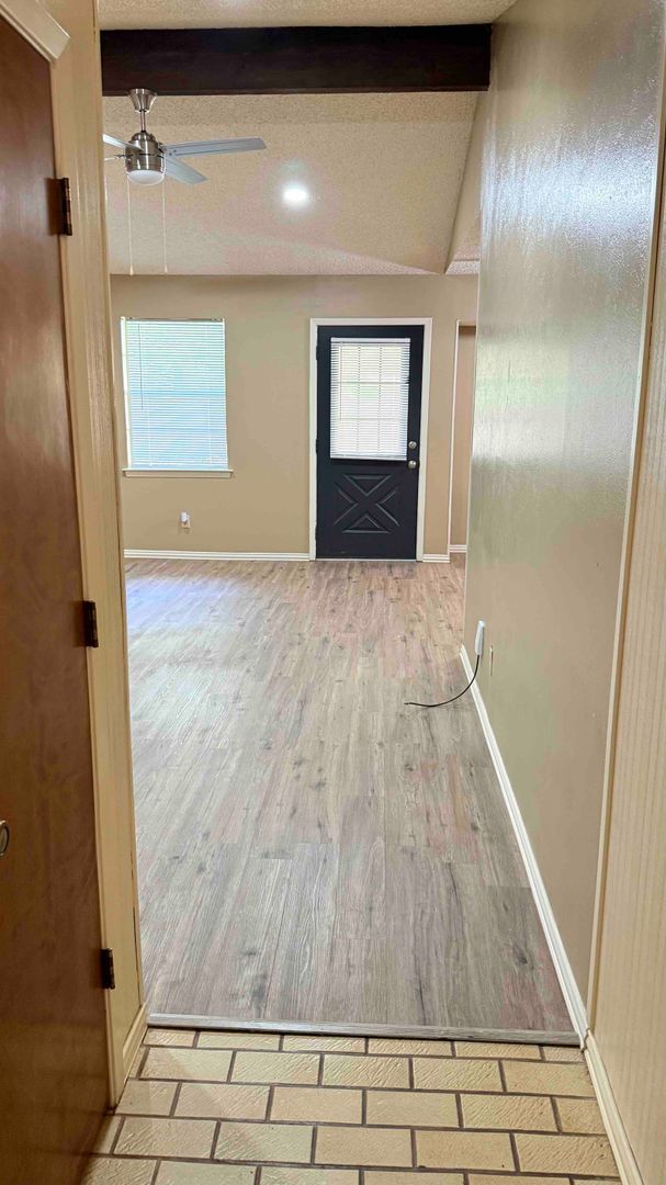 Photo - 3 bedroom / 2 bath / 2 car garage - Covered porch with shaded back yard