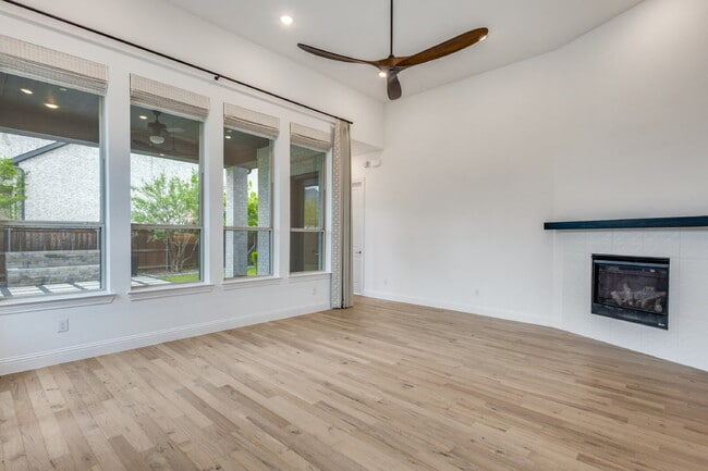 Photo - "Luxurious 4-Bed Retreat with Movie Room & Marble Elegance in Celina, TX!"