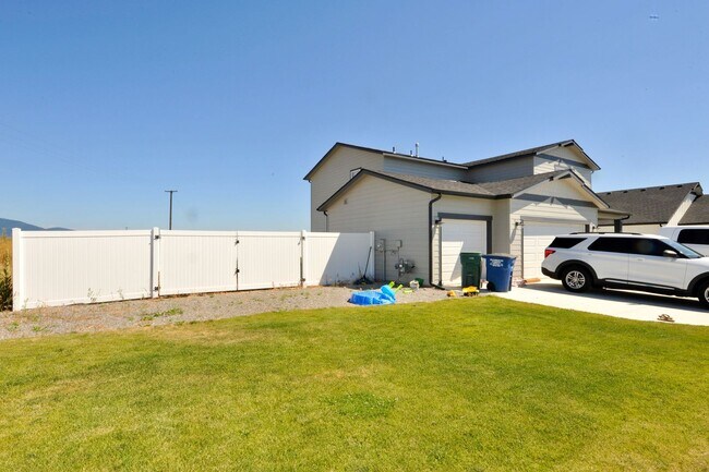 Photo - Practically NEW!! 4 bed 3 bath home, 3 car garage & RV parking