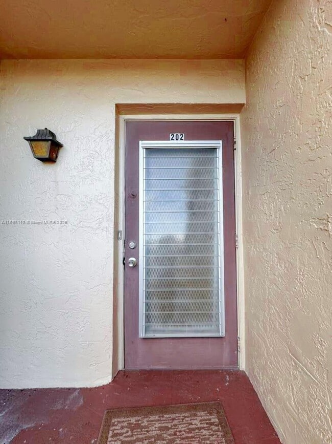Building Photo - 7331 NW 18th St Unit 202