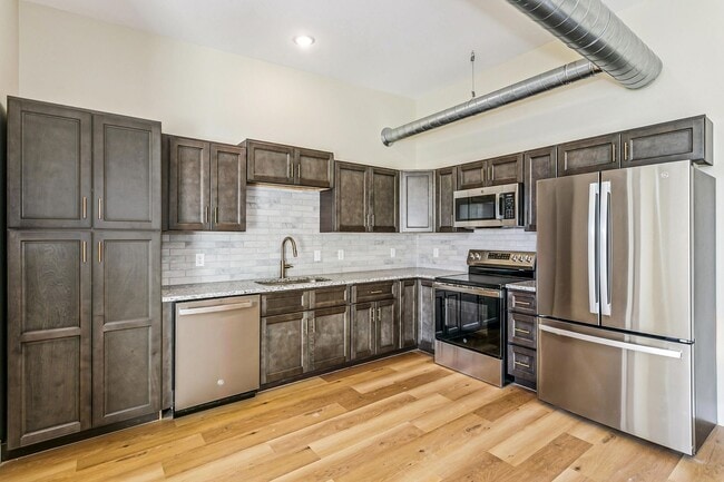 Building Photo - Brand New Apartments Available Now! Get $1000 credit towards rent and/or monthly fees! Unit 203