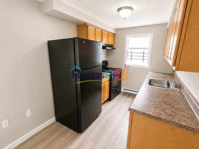 Building Photo - 311 Littleton Ave Unit 3A
