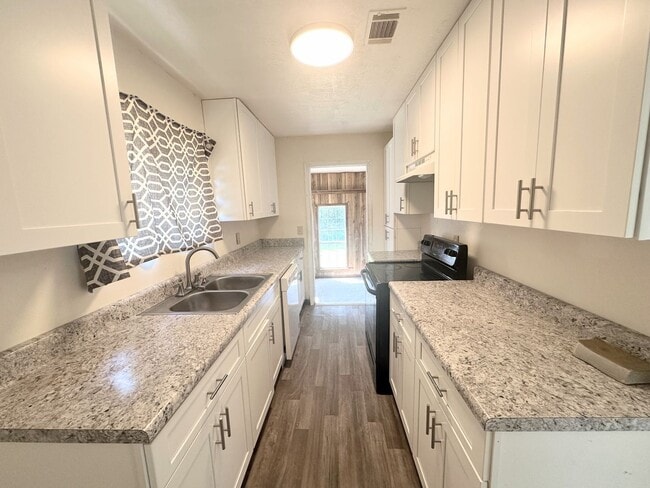 Photo - Bright kitchen updates in quiet Culdesac