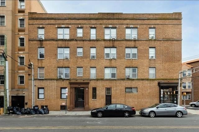 Building Photo - 203 Academy St Unit 423