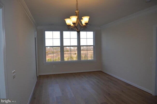 Building Photo - 13724 Neil Armstrong Ave Unit 307 Rental
