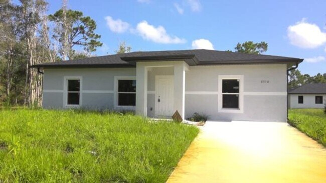 Building Photo - Brand NEW Three Bedroom/2 bath SW LEHIGH A... Rental