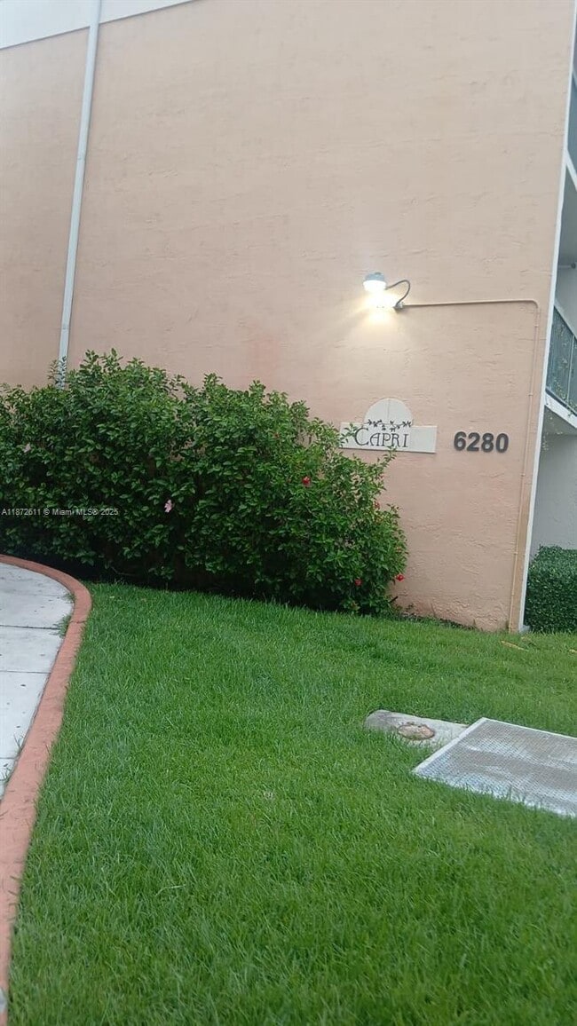 Building Photo - 6280 NW 186th St Unit 303