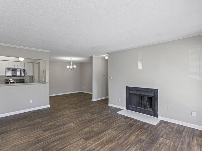 Cozy living spaces feature fireplaces and beautiful wood flooring for comfortable entertaining, professionally operated by Highlands Vista Group.