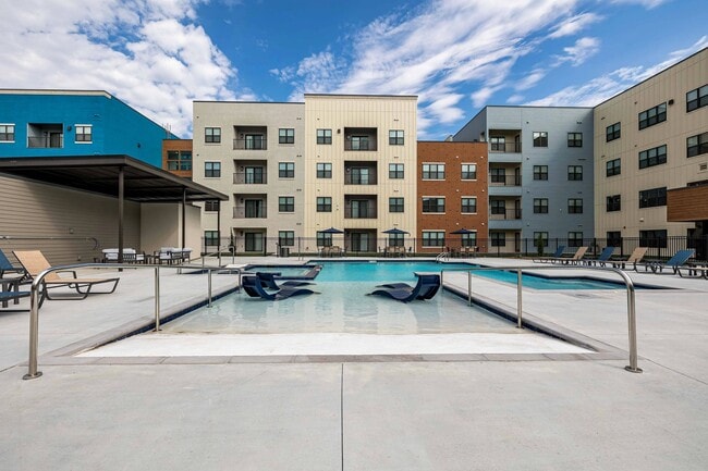 Discover modern living at Union Mill, where contemporary design meets resort-style amenities. Enjoy spacious outdoor lounging by the pool, perfect for relaxation and socializing. Don't miss your chance to elevate your lifestyle—schedule a tour today!