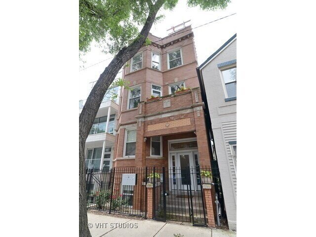 Building Photo - 2-Bed, 2-Bath Urban Retreat with Fireplace & Hardwood Floors Unit 2