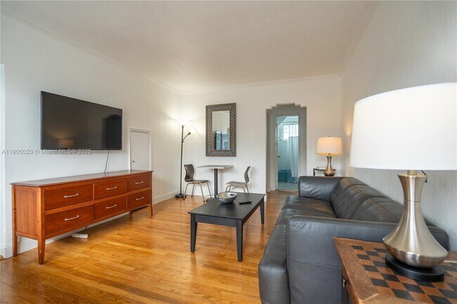 Building Photo - 7445 Harding Ave Unit 213A