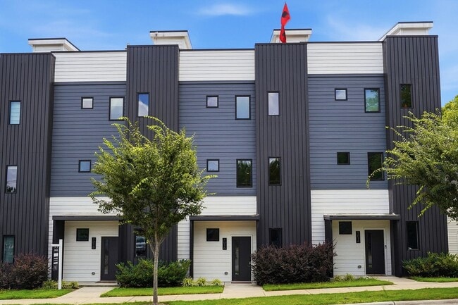 Building Photo - Live Elevated in Downtown Raleigh – Stunning Townhome with Rooftop Oasis!