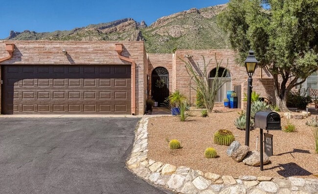 Building Photo - Sophisticated Catalina Foothills Sanctuary: Premium 3-Bedroom Townhome with 2-Car Garage