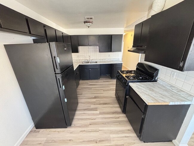 Photo - 6940 Hopkins Dr Unit 1