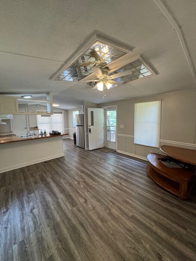 Photo - 2 bedrooms, 1 full bath located on a quiet lot. 1 story living with a great open floor plan. Very...