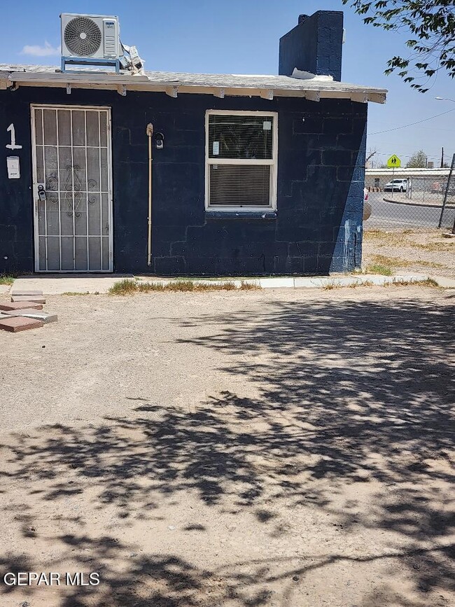 Building Photo - 7837 West Dr Unit 3