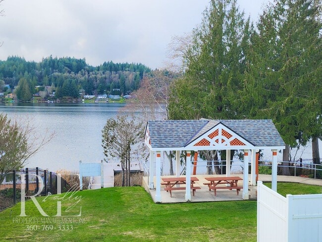 Building Photo - Modern Elegance Meets Tranquil Lakeside Living On Osprey Circle